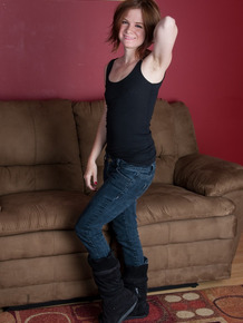 Cute redhead Zia drops her jeans and stretches wide open to show a ginger muff