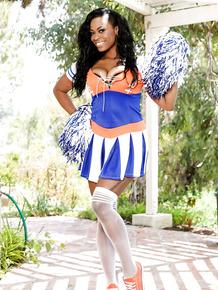 Ebony cheerleader Tori Taylor uncovers boobs & flashes her pussy on patio