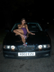 Long legged UK chick exposes her boobs on bonnet of car at night