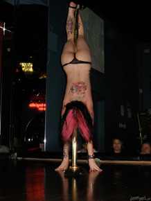 Clothed amateur milf Joanna Angel dose a sexy striptease dance