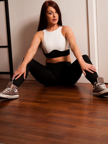 Glamor model Amber Mae slips spandex leggings over her hot ass in sneakers