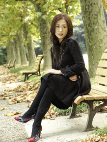 Fully clothed Japanese teen models in the park in black clothes and stockings