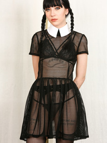 Tall thin Charlotte Sartre as Wednesday Addams strips sheer dress to spread