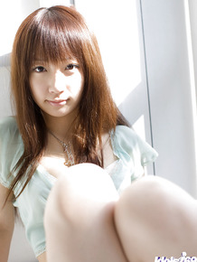 Pretty asian teen Hina Kurumi revealing her tiny tits with hard nipples