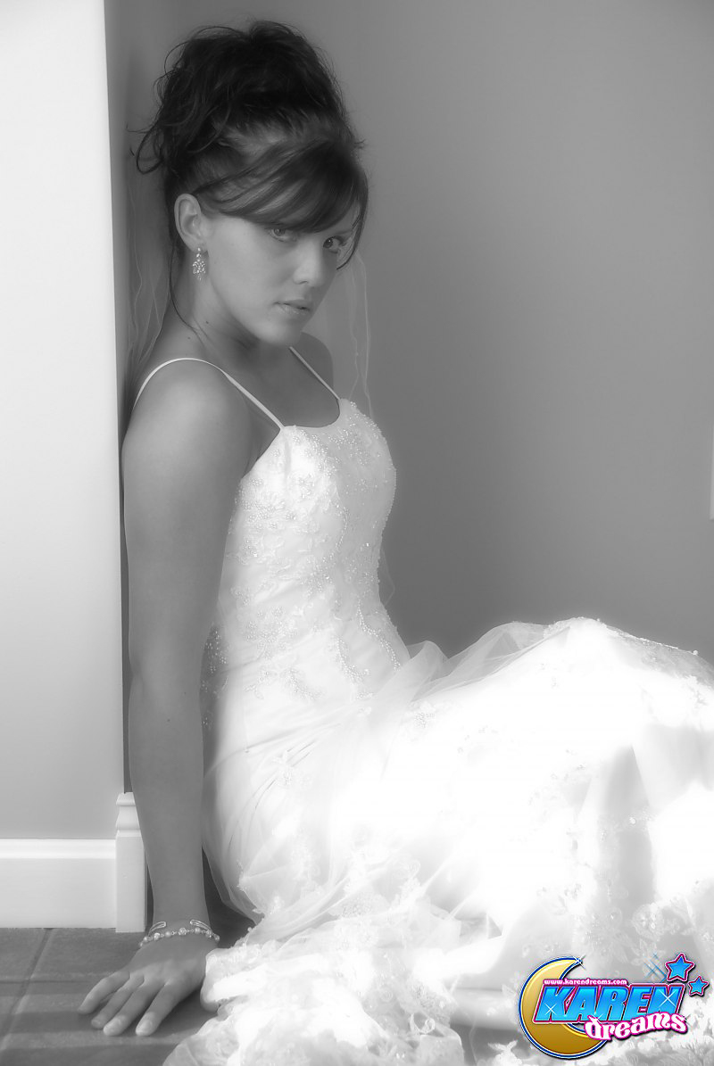 Amateur model Karen poses in wedding dress during solo action pic
