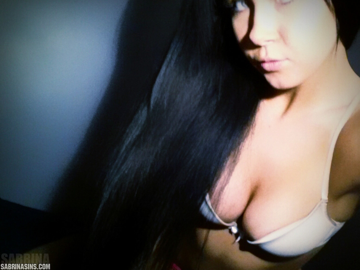 Amateur chick with long black hair Sabrina Sins takes nude selfies