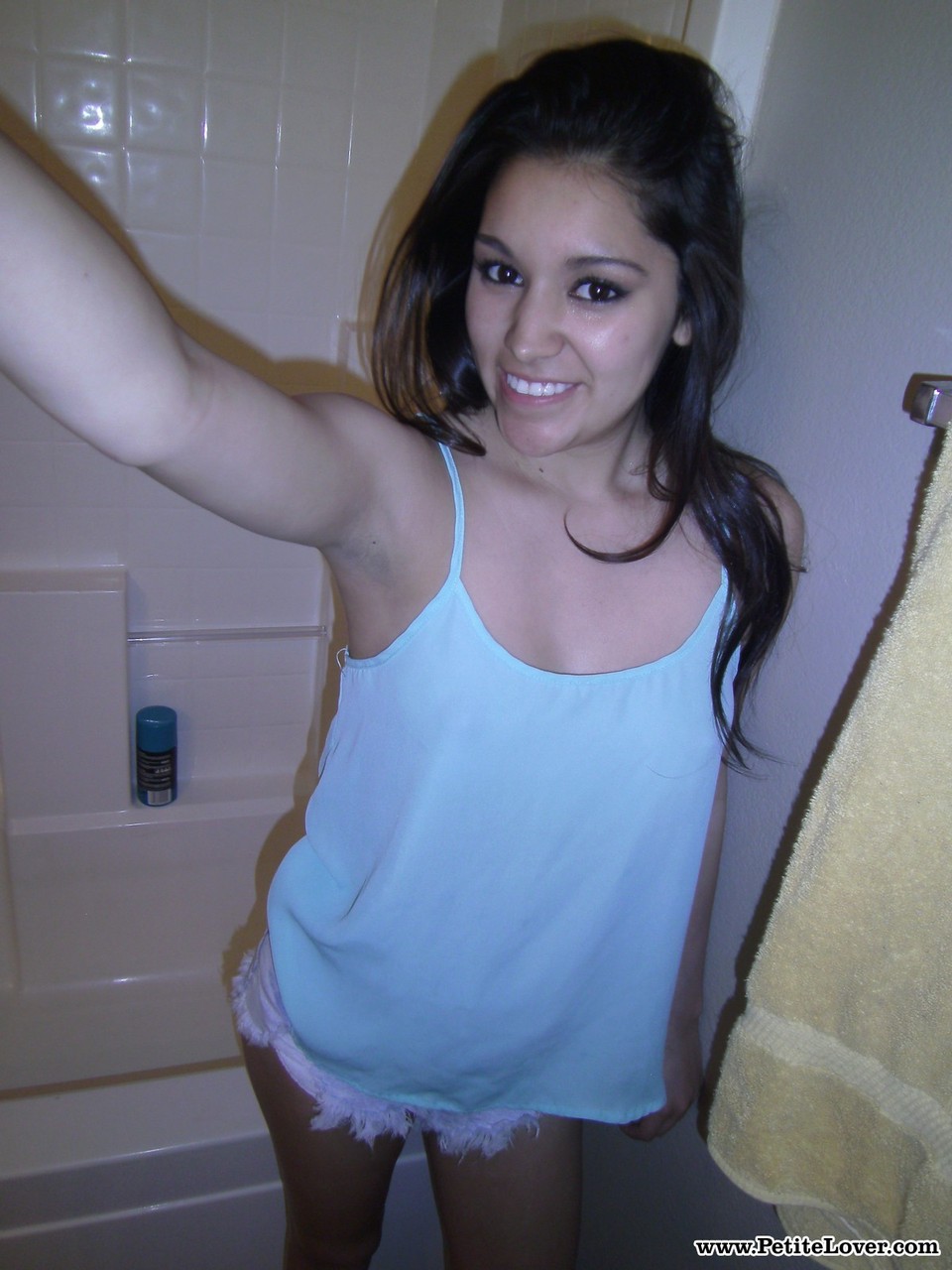Petite amateur brunette cutie Selena takes a selfie of her hot tits and ass  picture