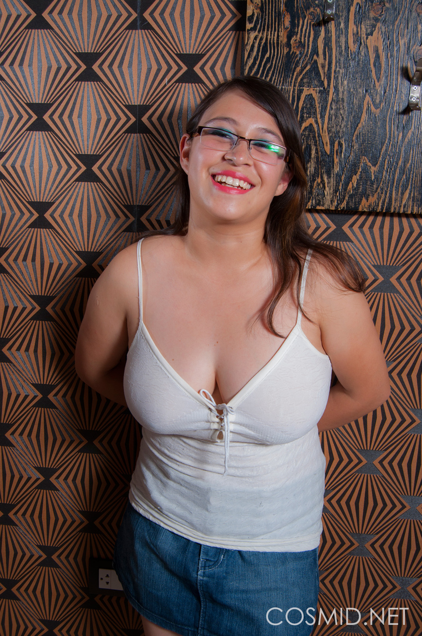 Chubby amateur takes off her glasses before unleashing her big natural tits  pic