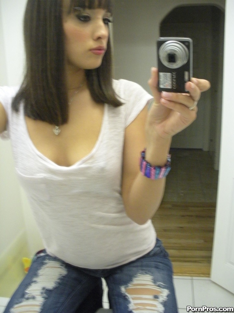 Ex-girlfriend Nadia Aria undresses in bathroom mirror while taking self shots photo photo