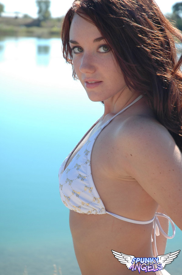 Beautiful teen amateur Heidi sheds bikini bra to show small tits at the beach